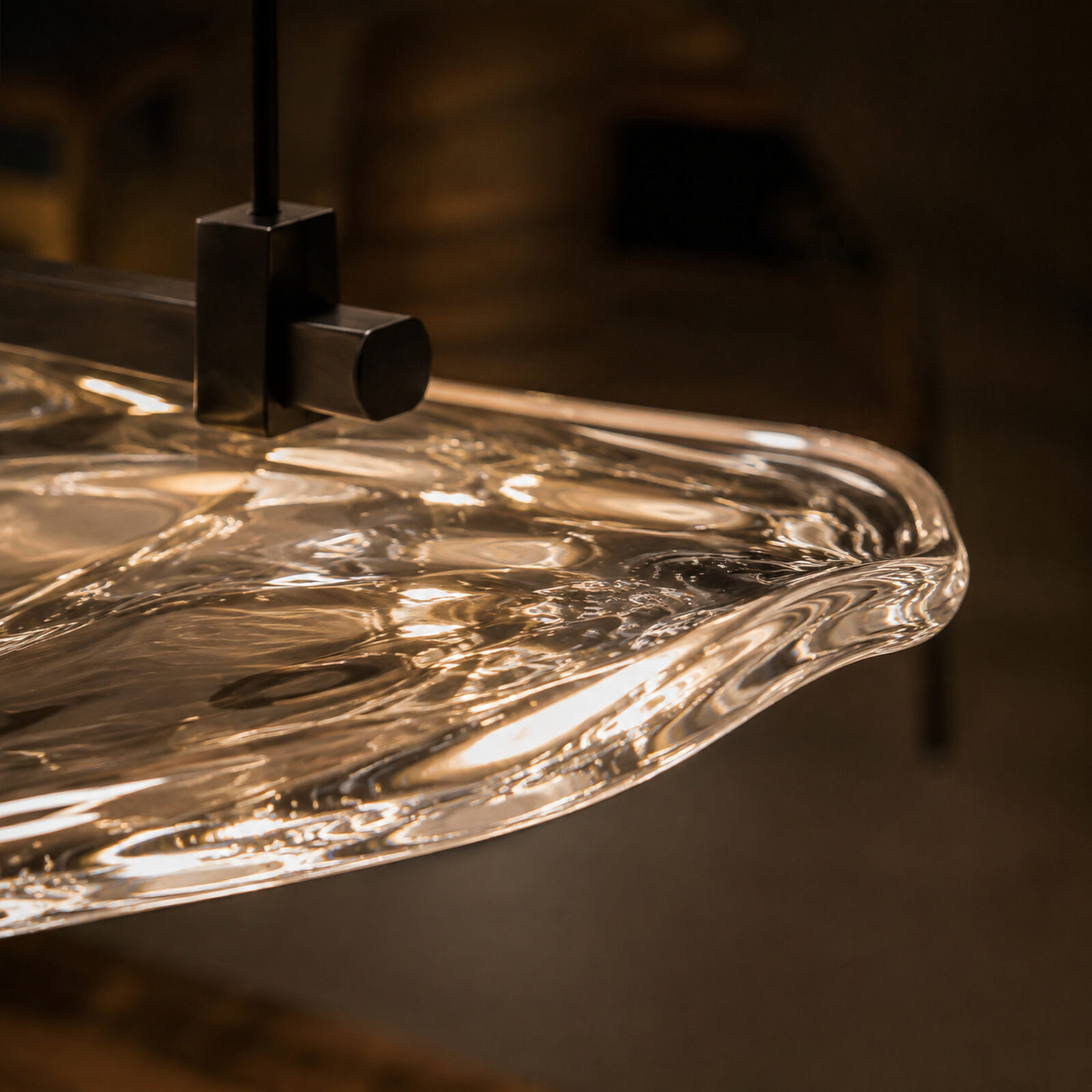 Onda: The kept edge. Hot glass settled over the steel mould and left it.